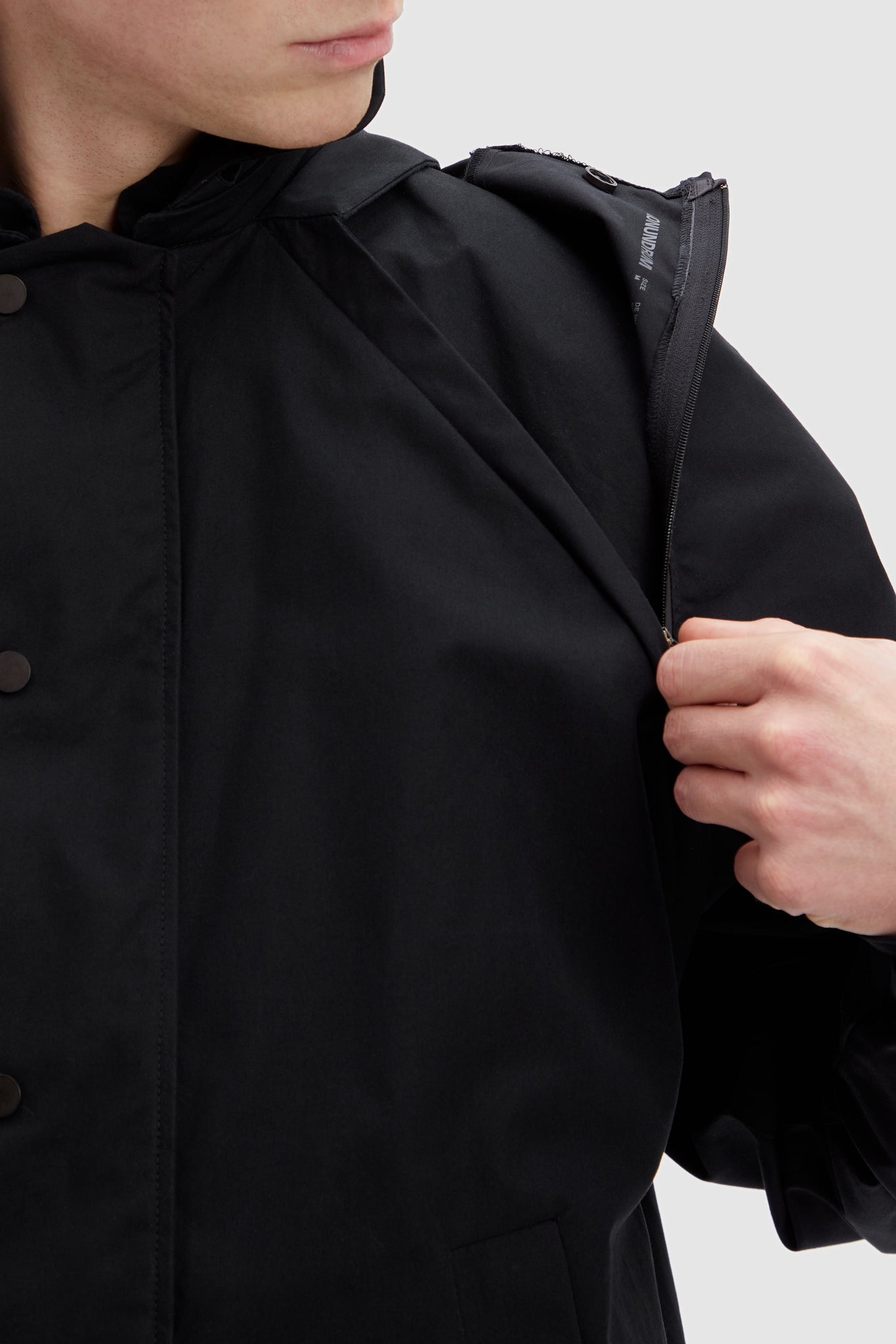 100% Organic Cotton Jacket in colour black Modular jacket detail